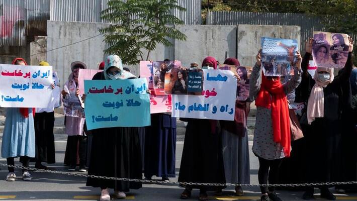 Taliban fire into air to disperse womens rally Taliban fire into air to disperse womens rally