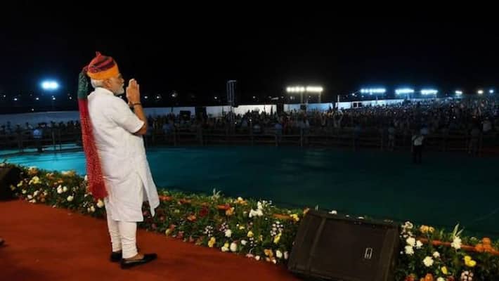 PM Modi skips microphone to obey loudspeaker rule in Rajasthan Rally PM Modi skips microphone to obey loudspeaker rule in Rajasthan Rally