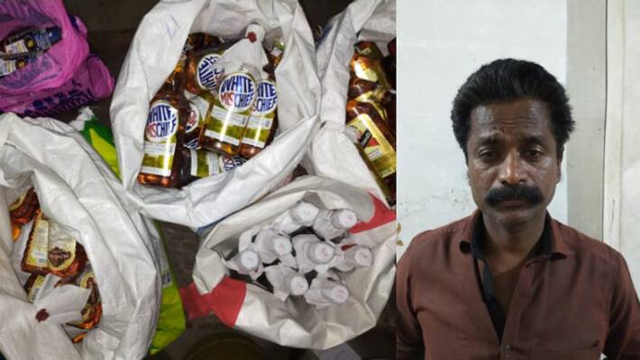 man arrested with liquor stored for sale idukki man arrested with liquor stored for sale idukki