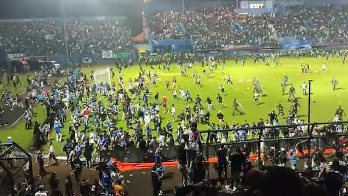 at least 129 dead after riot at indonesia football match ash at least 129 dead after riot at indonesia football match ash