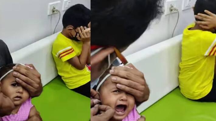 brother gets emotional watching sister ear piercing brother gets emotional watching sister ear piercing