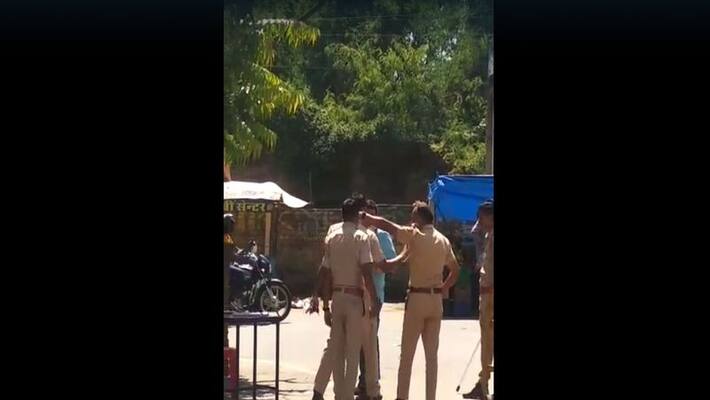 Policeman slaps not wearing helmet video goes viral pwt Policeman slaps not wearing helmet video goes viral pwt