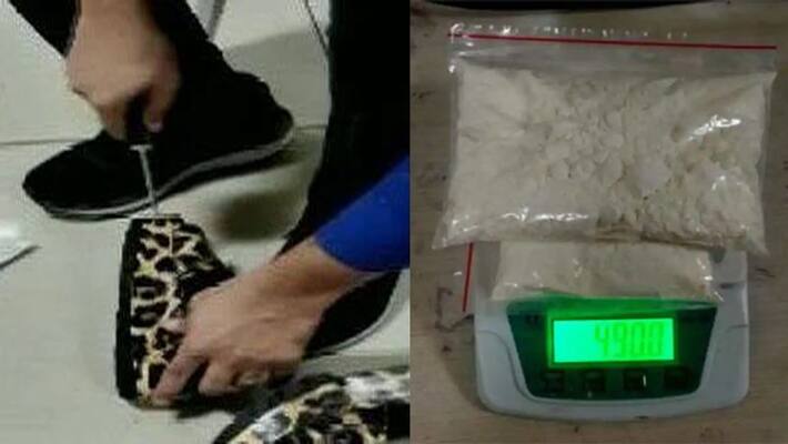 A woman caught at Mumbai airport hiding 490 grams cocaine in her sandals dva A woman caught at Mumbai airport hiding 490 grams cocaine in her sandals dva