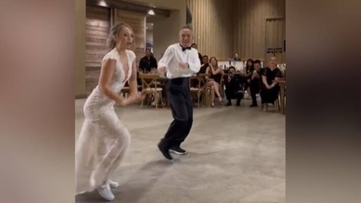 bride and her father dancing together on wedding day bride and her father dancing together on wedding day
