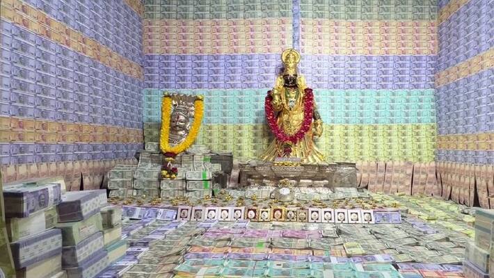 amman temple decorated with currency notes worth 8 Crores at andhara amman temple decorated with currency notes worth 8 Crores at andhara