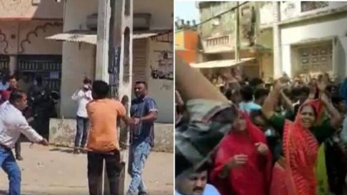 men attacked publicly by police for pelting stones at Garba event in Gujarat men attacked publicly by police for pelting stones at Garba event in Gujarat