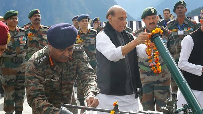 Armed forces are real pride of India: Rajnath Singh hails soldiers' valour; performs 'Shastra Puja' in Auli - adt Armed forces are real pride of India: Rajnath Singh hails soldiers' valour; performs 'Shastra Puja' in Auli - adt