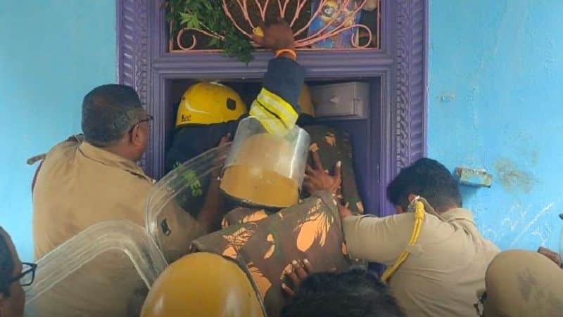 Rumors of human sacrifice in Arani Police demolished the house with jcb machine