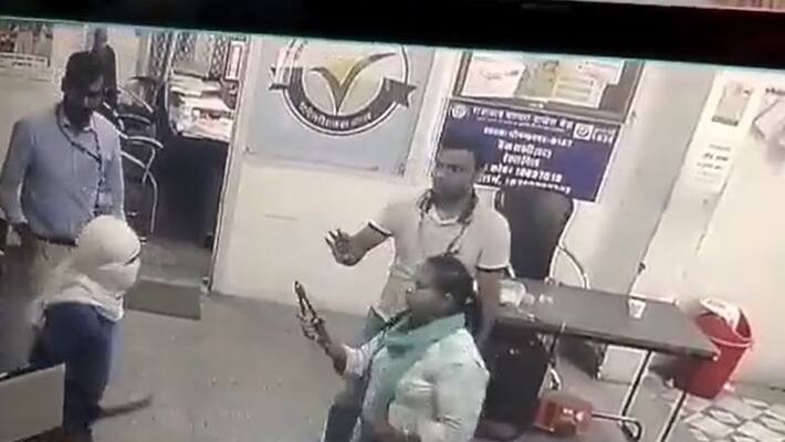 female bank manager bravely faced the robber and video goes viral female bank manager bravely faced the robber and video goes viral