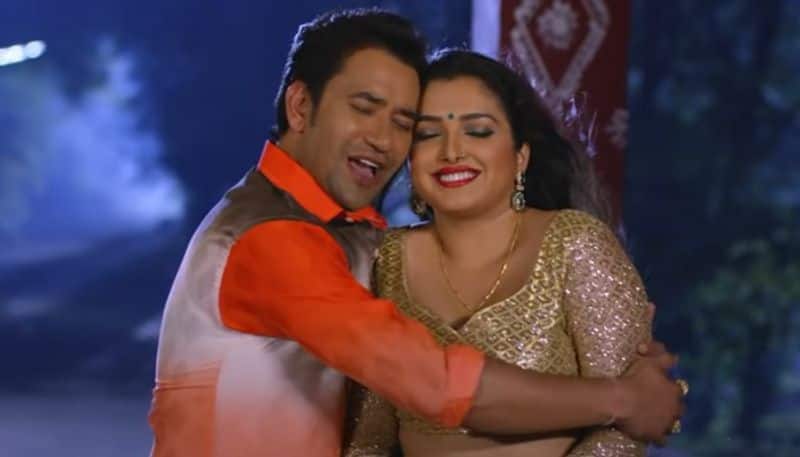 Amrapali Dubey Xnxx - Bhojpuri SEXY video: Amrapali Dubey, Nirahua's romantic rain dance in  'Karela Man Pat Jayi' is a must WATCH