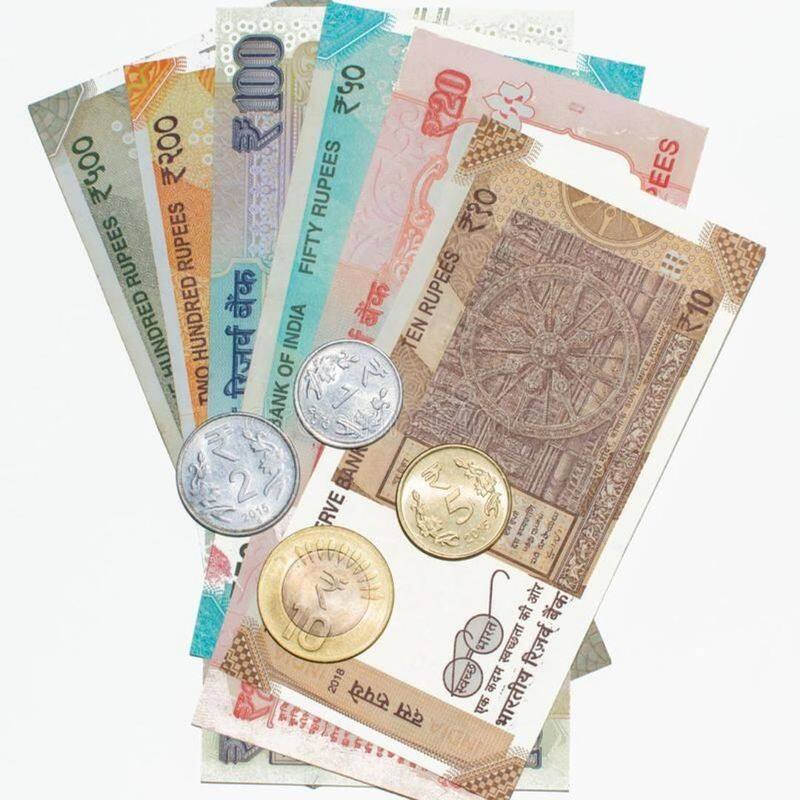 What is process of designing Indian currency notes and who does it