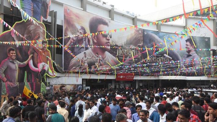 Fans Celebrate Puneeth Rajkumars Gandhada Gudi Movie Release In Karnataka gvd Fans Celebrate Puneeth Rajkumars Gandhada Gudi Movie Release In Karnataka gvd