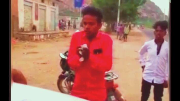 jalore news man fake acting to escape from police chalan see video asc jalore news man fake acting to escape from police chalan see video asc
