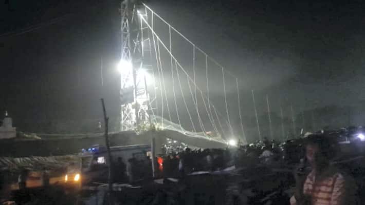 Gujarat 32 dead as 100-year-old suspension bridge collapses in Morbi rescue operation underway snt Gujarat 32 dead as 100-year-old suspension bridge collapses in Morbi rescue operation underway snt