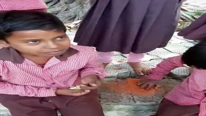 Kanpur Principal brutally thrashes an innocent child for not bringing a plate for mid day meal video of student crying hysterically goes viral Kanpur Principal brutally thrashes an innocent child for not bringing a plate for mid day meal video of student crying hysterically goes viral