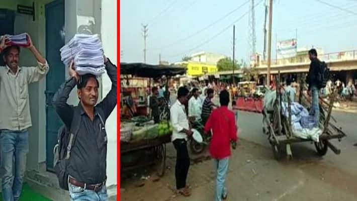 RTI activist reached with bullock cart and music band to collect RTI report in shivpuri PRA RTI activist reached with bullock cart and music band to collect RTI report in shivpuri PRA