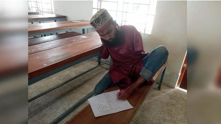 19 year old took part in the examination by writing with his feet, Success and motivational story kpa 19 year old took part in the examination by writing with his feet, Success and motivational story kpa