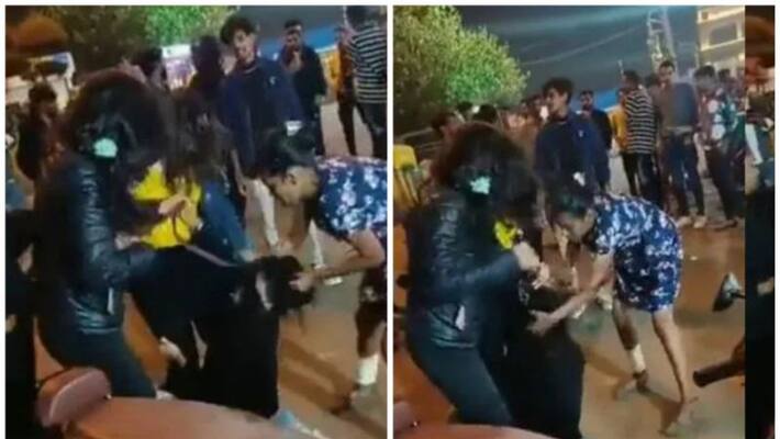 a woman was brutally thrashed by a gang of four women in Indore a woman was brutally thrashed by a gang of four women in Indore