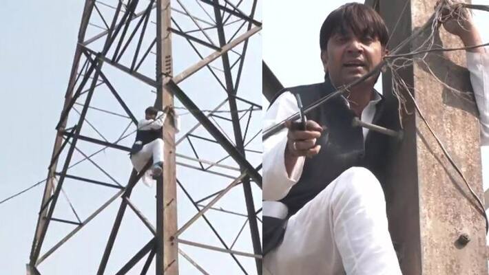 Denied ticket ex AAP councillor climbs tower, threatens to kill himself Denied ticket ex AAP councillor climbs tower, threatens to kill himself