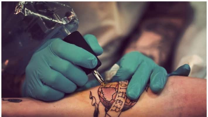 Mother and tattoo artist Arrested after 10 year old son get tattooed in NewYork akb Mother and tattoo artist Arrested after 10 year old son get tattooed in NewYork akb