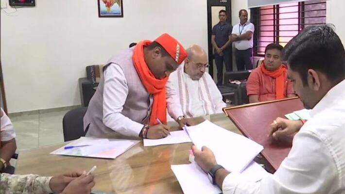 Gujarat Assembly Election 2022 Amit Shah accompanies Sanand constituency candidate Kanu Patel filing nomination for gujarat vidhansabha chunav apa Gujarat Assembly Election 2022 Amit Shah accompanies Sanand constituency candidate Kanu Patel filing nomination for gujarat vidhansabha chunav apa