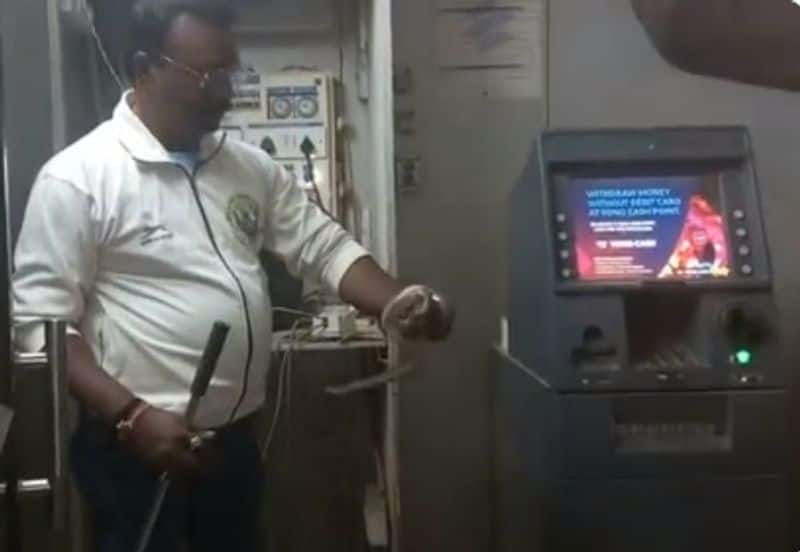 snake caught from atm machine in maharashtra and video goes viral
