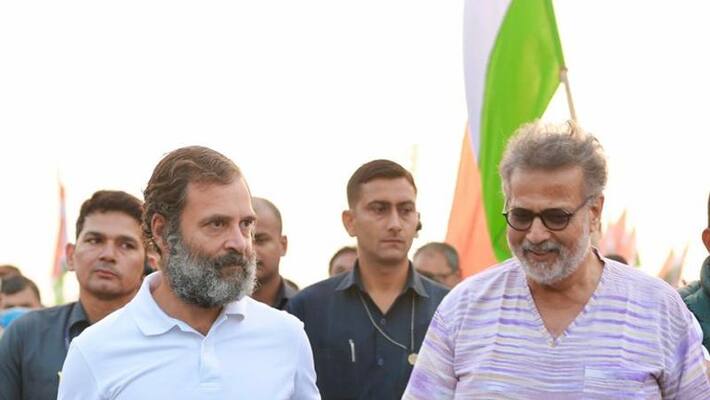 Rahul Gandhi joins Mahatma Gandhi's great grandson Tushar Gandhi in the Bharat Jodo Yatra Rahul Gandhi joins Mahatma Gandhi's great grandson Tushar Gandhi in the Bharat Jodo Yatra