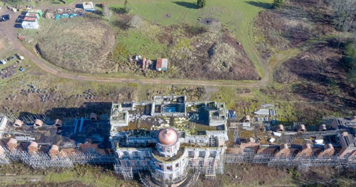 Bigger than Buckingham Palace, now like a house in a horror movie, abandoned bungalow for 20 years