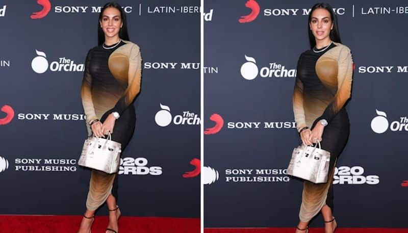 Georgina Rodriguez Models Louis Vuitton in Bodycon Dress & Pumps – Footwear  News