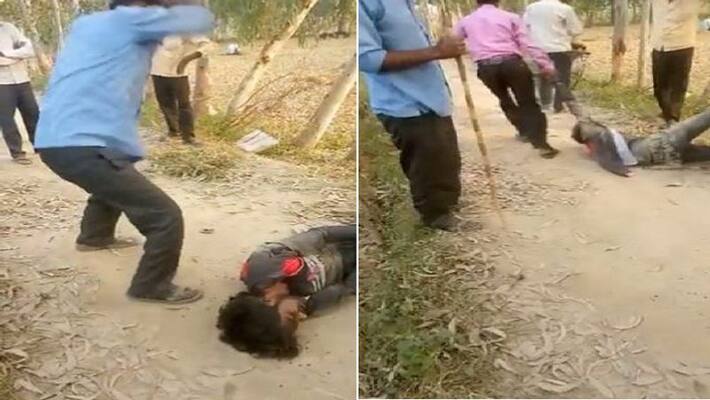 Bareilly accused thrashed young man with stick victim kept apologizing with folded hands video went viral Bareilly accused thrashed young man with stick victim kept apologizing with folded hands video went viral