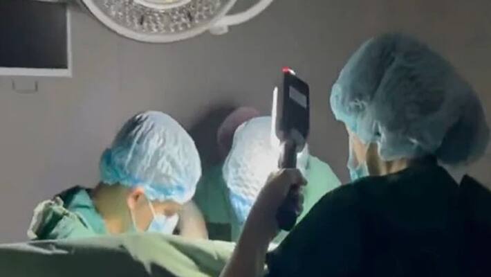doctors perform heart surgery in emergency light in ukraine after russian missile strikes doctors perform heart surgery in emergency light in ukraine after russian missile strikes