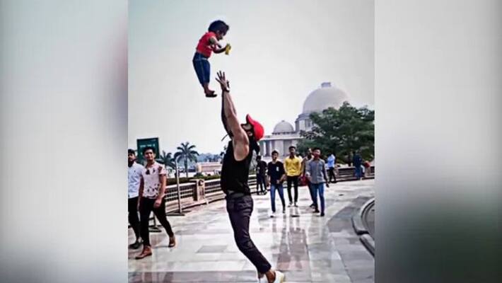mans stunt with kid goes viral in social media mans stunt with kid goes viral in social media
