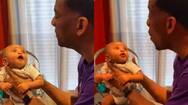 Adorable video shows 2 month old baby boy singing with his grandfather