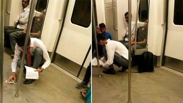 young boy cleans delhi metro floor after he spilled food internet impressed ash young boy cleans delhi metro floor after he spilled food internet impressed ash