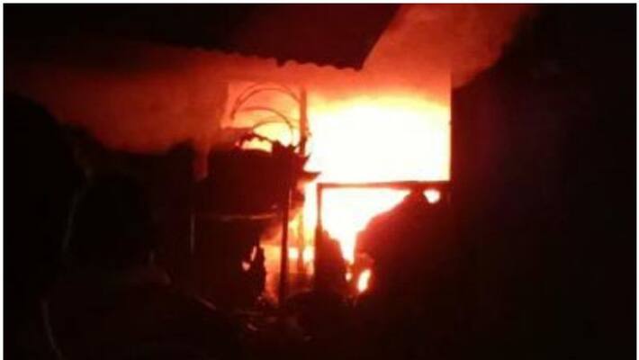 man catches when he stole money later he set fire the shop man catches when he stole money later he set fire the shop