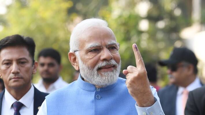 PM Modi votes in the Gujarat Assembly elections in Ahmedabad PM Modi votes in the Gujarat Assembly elections in Ahmedabad
