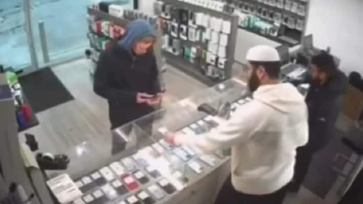 UK Man tried to theft mobile phone at show room if you watch what happen next you may laugh hard akb UK Man tried to theft mobile phone at show room if you watch what happen next you may laugh hard akb
