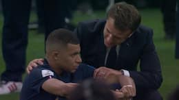 Picture of French President Emmanuel Macron on haunches consoling Mbappe after Fifa loss is winning hearts kvn