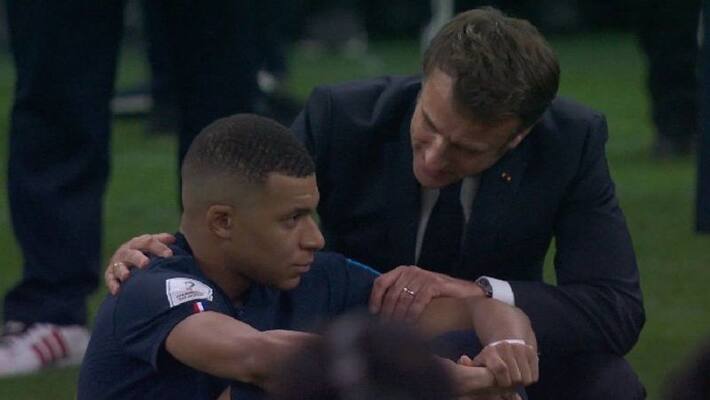 Picture of French President Emmanuel Macron on haunches consoling Mbappe after Fifa loss is winning hearts kvn Picture of French President Emmanuel Macron on haunches consoling Mbappe after Fifa loss is winning hearts kvn