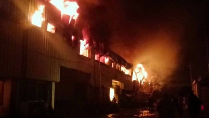 over 20 cars gutted in fire in multi level parking in delhi over 20 cars gutted in fire in multi level parking in delhi