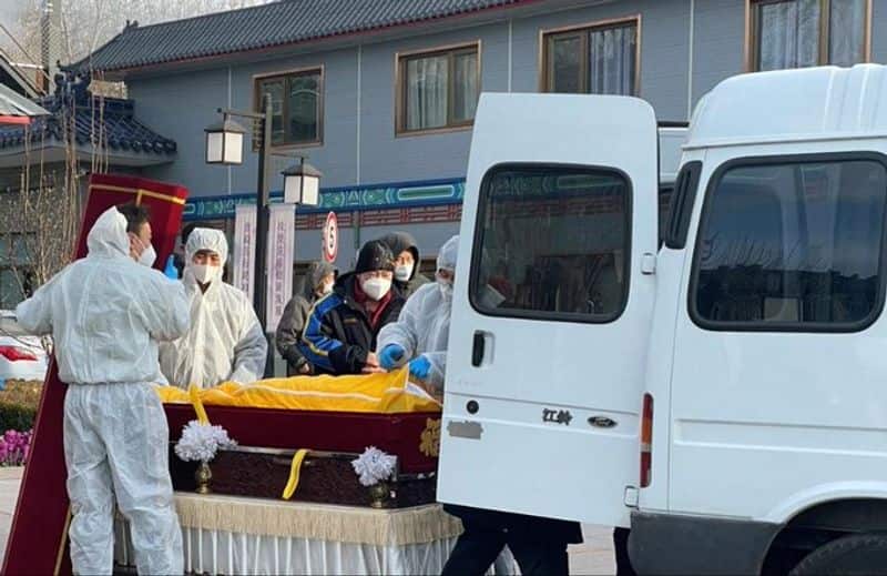 Whats going on in China? Corona death that is uncontrollable Dead people lining up at the cemetery