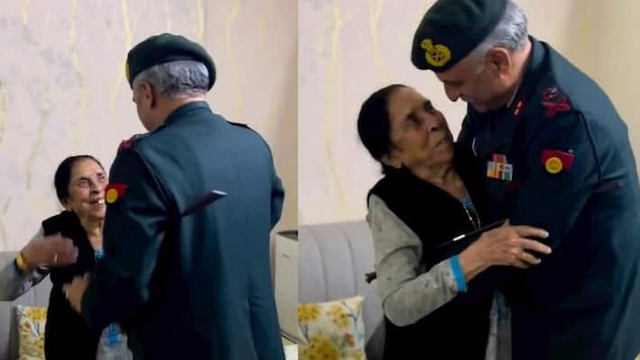 A final salute from an army officer in uniform to Mother before her retirement akb A final salute from an army officer in uniform to Mother before her retirement akb
