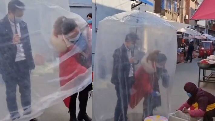 china couple came to buy vegetables with unique umbrella watch viral video akb china couple came to buy vegetables with unique umbrella watch viral video akb