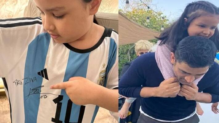 MS Dhoni daughter Ziva poses with Lionel Lionel Messi signed Argentina jersey kvn MS Dhoni daughter Ziva poses with Lionel Lionel Messi signed Argentina jersey kvn