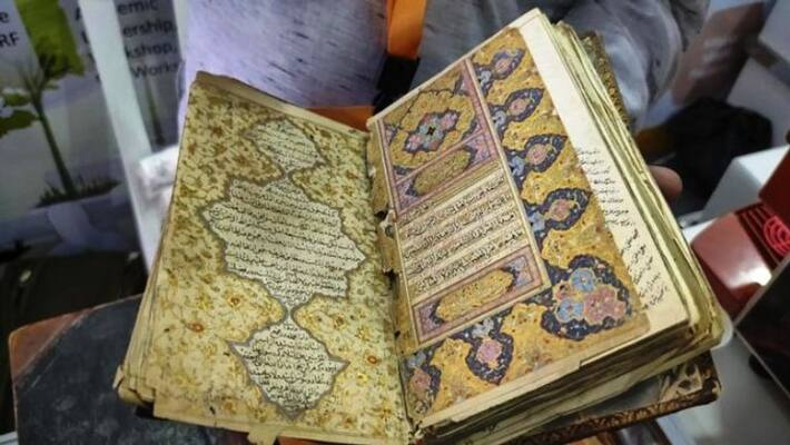 gold ink Quran and ancient manuscripts ! show at the World Science Congress. gold ink Quran and ancient manuscripts ! show at the World Science Congress.