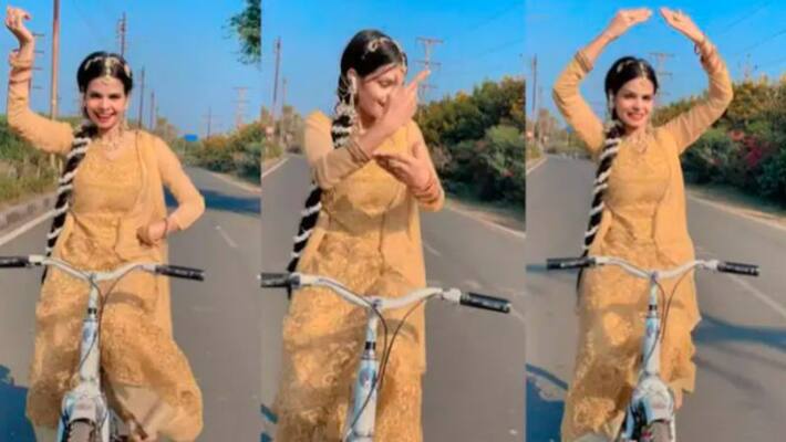 Woman Dances On Yeh Ladka Hai Allah While Cycling Woman Dances On Yeh Ladka Hai Allah While Cycling