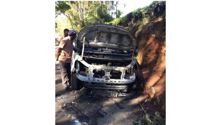 car caught fire while running in Munnar car caught fire while running in Munnar