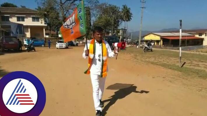 Chikkamagaluru Ashraf protest by holding a BJP flag against encroachment gow Chikkamagaluru Ashraf protest by holding a BJP flag against encroachment gow