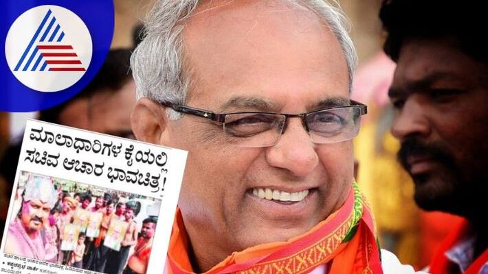 Ayyappa maladhari hold portrait of the ministe halappa achar koppal rav Ayyappa maladhari hold portrait of the ministe halappa achar koppal rav