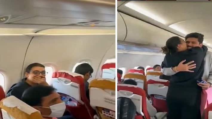 Man surprises fiancee by proposing to her onboard Air India flight Man surprises fiancee by proposing to her onboard Air India flight